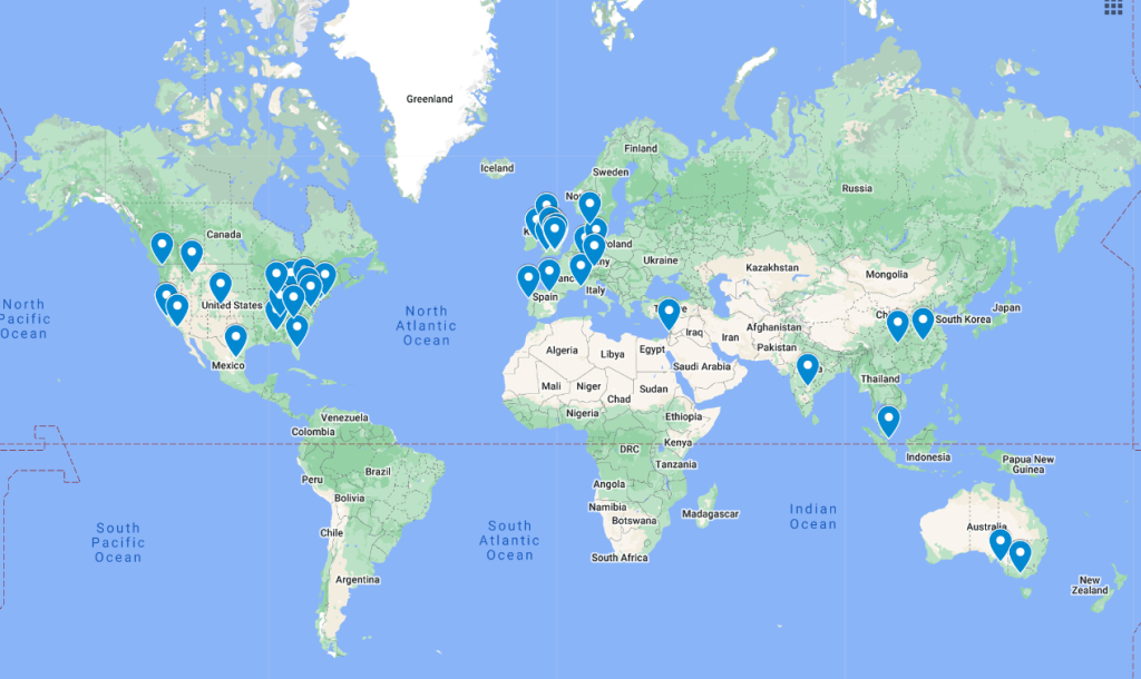 Map of the world with pins on locations of attendees.
